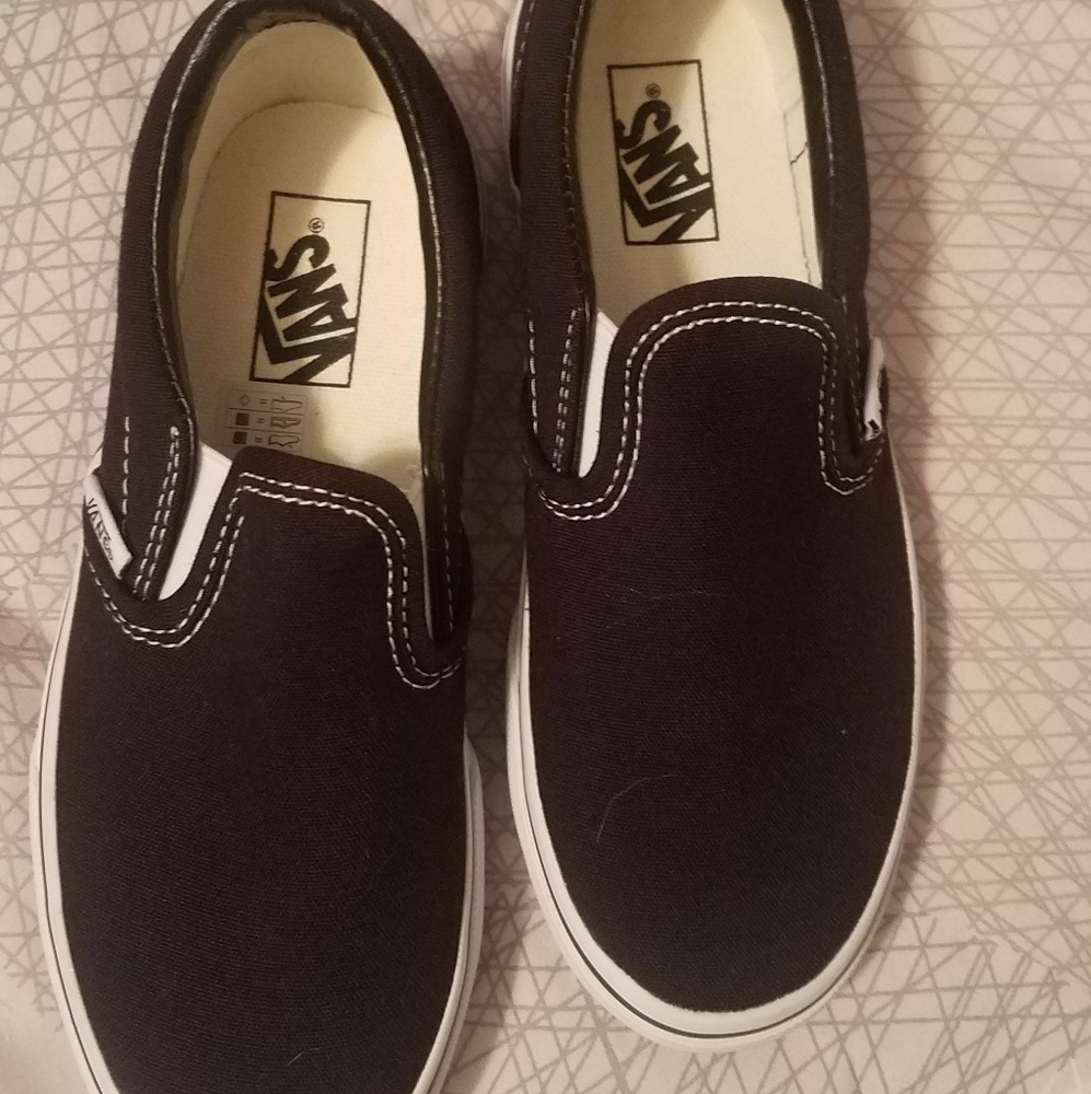 Boys Vans black slip on. NEVER WORN